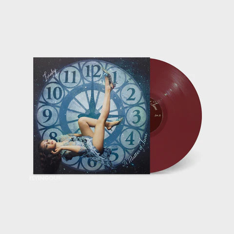 LAUFEY - A MATTER OF TIME(ROUGE COLOURED VINYL - 24” FOLD OUT POSTER WITH A NOTE FROM LAUFEY, 7” VINYL & EXCLUSIVE PHOTOS OF LAUFEY)