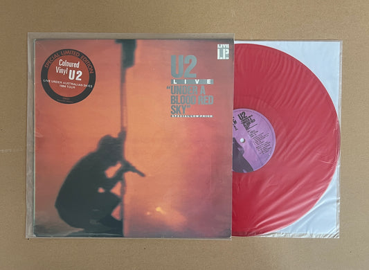 U2 - UNDER A BLOOD RED SKY(“LIVE UNDER AUSTRALIAN SKIES” TOUR EDITION) IN RED VINYL! SLEEVE - NM / RECORD - NM